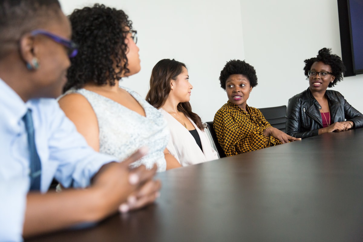 Diverse women professionals collaborating in a meeting